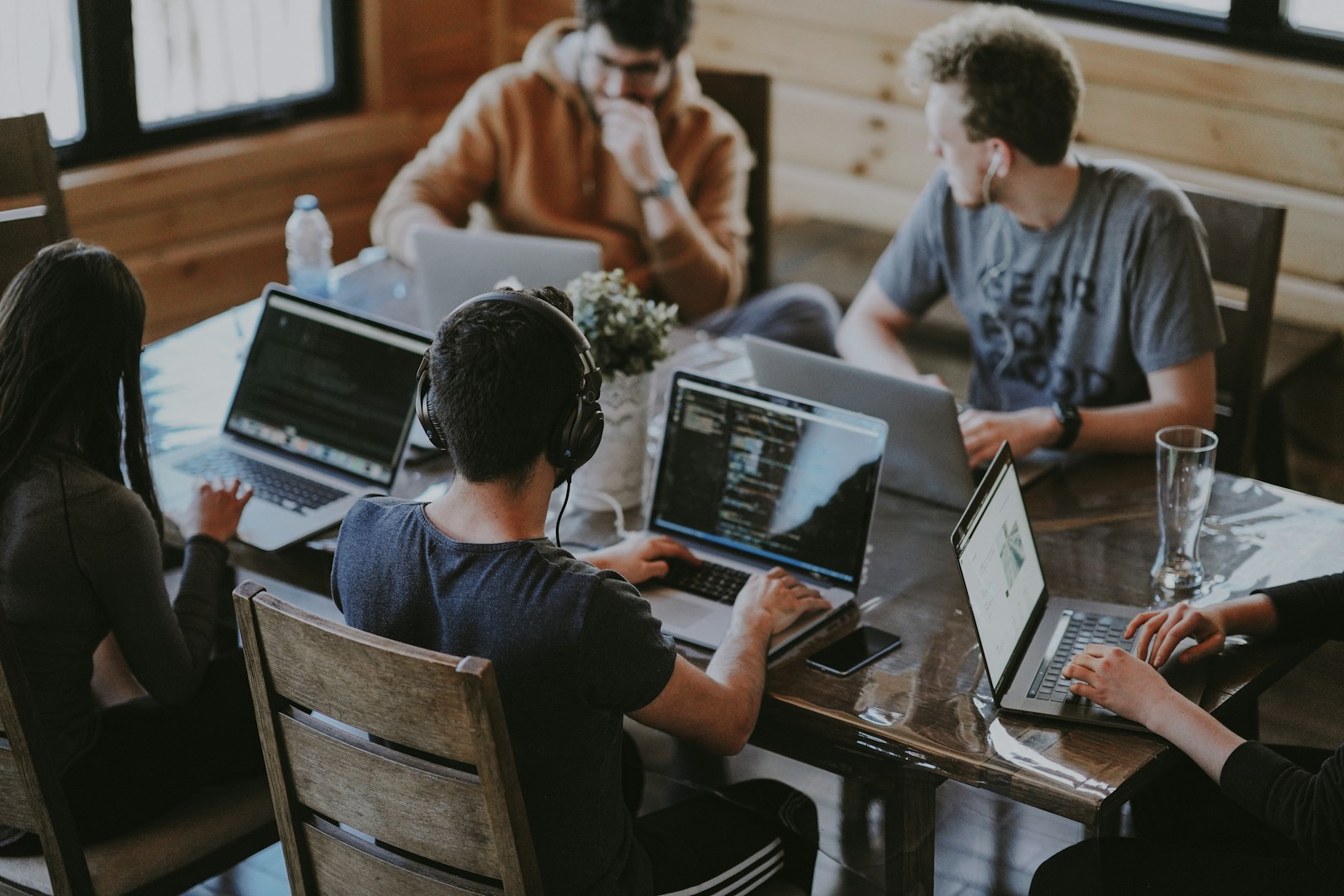 Team members meeting around a table